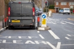 Photo of a van negotiating the Woodmere Avenue width restriction